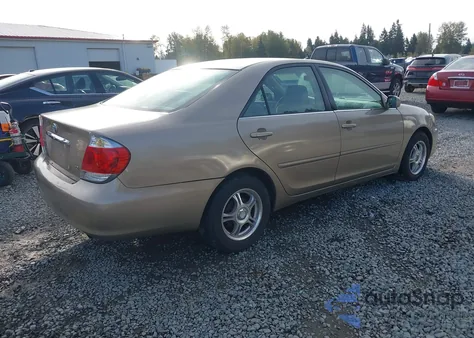 2005 Toyota Camry Le z USA, uszkodzony, nr VIN 4T1BE32K85U080394